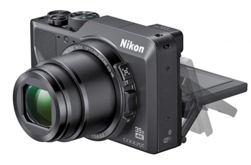 Компактный фотоаппарат Nikon Coolpix A1000. Вид слева. Схема поворота экрана.